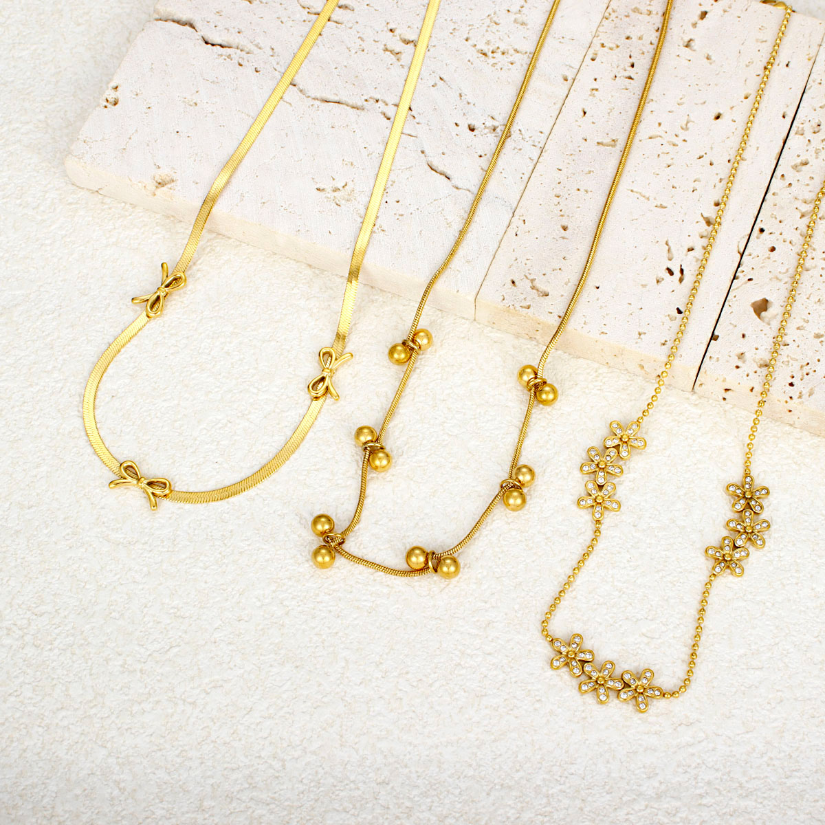 最新款18K镀金不锈钢首饰蛇形链小螺旋不规则时尚吊坠